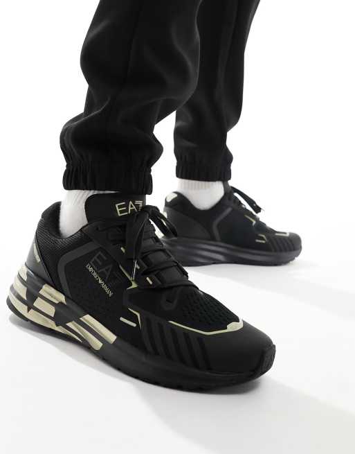 Armani - EA7 - Flyknit - Sneakers van nylon en mesh met goudkleurig logo in drievoudig zwart/goud