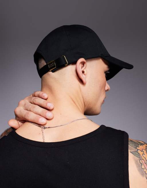 Armani EA7 logo baseball cap in black and gold | ASOS