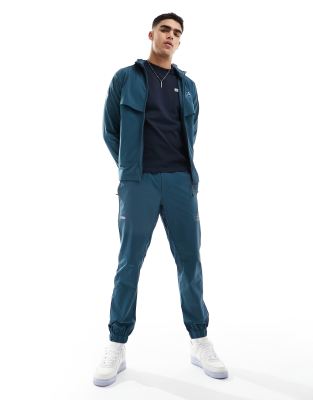 EA7 Armani EA7 logo nylon cuffed joggers in mid blue co-ord