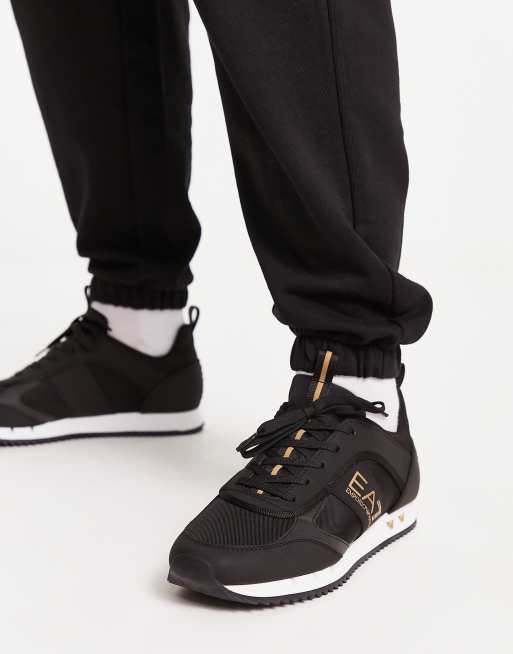 Armani EA7 side gold logo sneakers in black ASOS