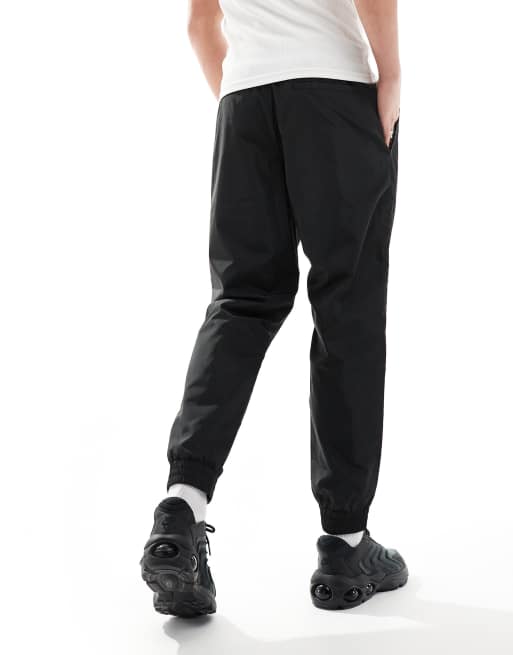 Armani - EA7 - Sorte joggingbukser med logo og lommer samt kantbånd i kontrast og tætsiddende benkanter, 5 af 5