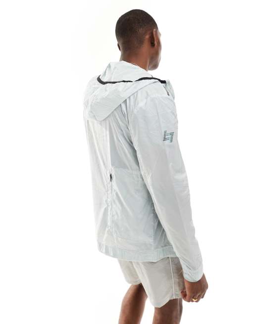 Armani EA7 Veste coupe vent a capuche avec logo et imprime geometrique sur l ensemble Bleu clair transparent