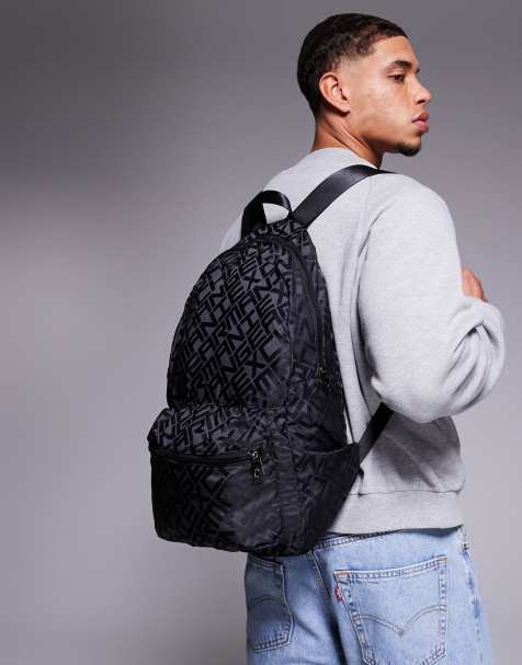 Armani Exchange 2 in 1 packable all over logo backpack in black - view 1