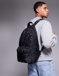 [Armani Exchange] Armani Exchange 2 in 1 packable all over logo backpack in black One Size BLACK