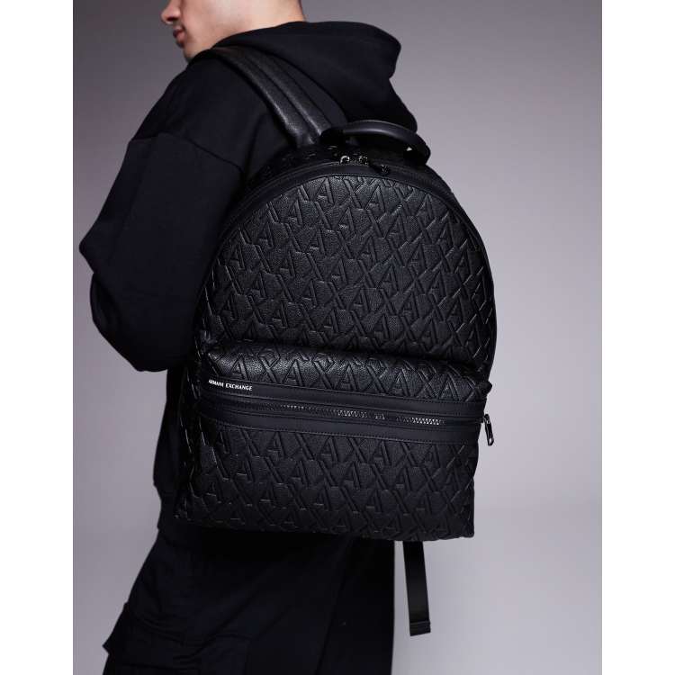 asos design backpack in faux leather in black phoenix Travel | Laptop Backpack The ASOS DESIGN rubberised rolltop backpack in black is a stylish and practical accessory for any modern man Men's Backpacks & Rucksacks |