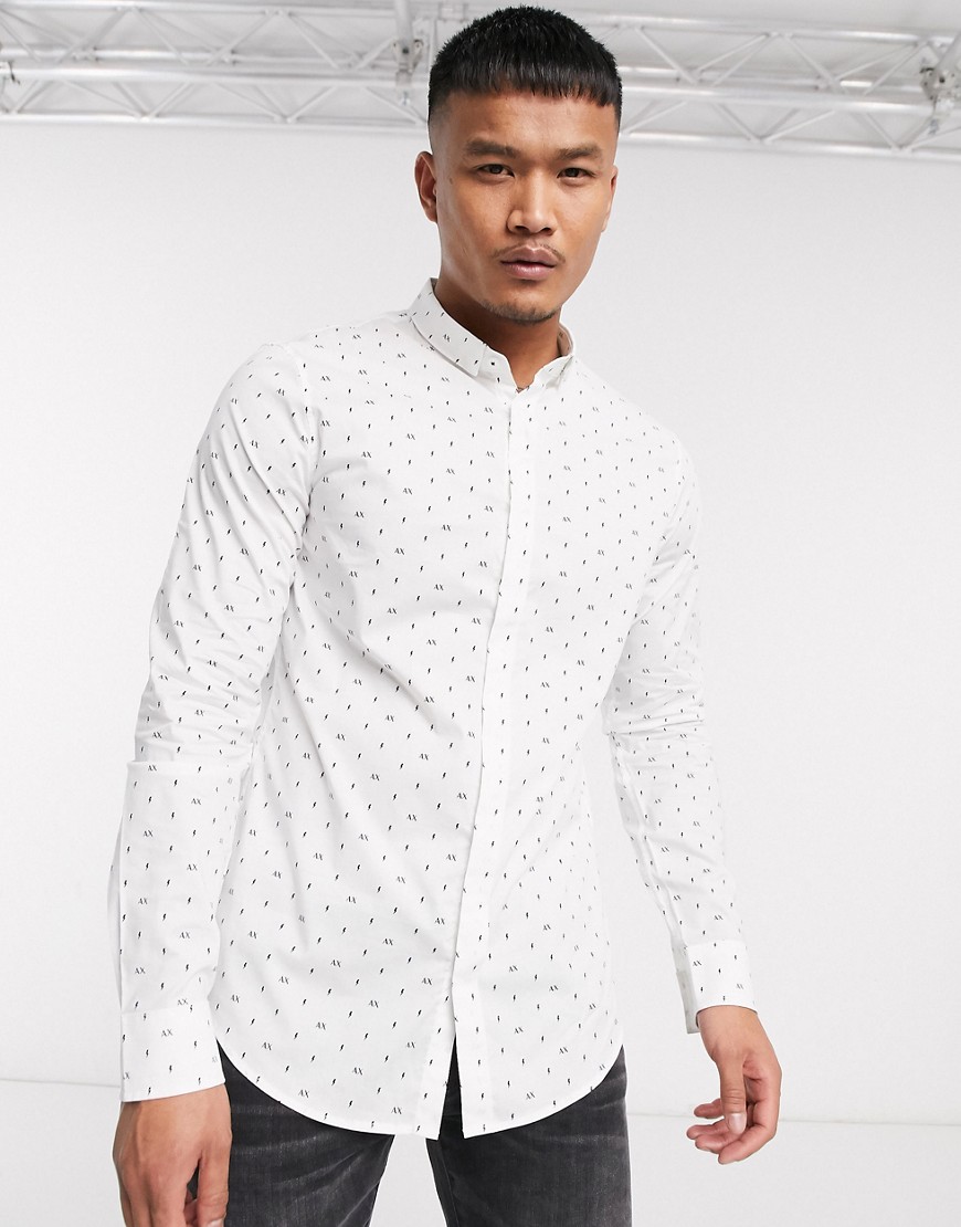 Armani Exchange all over logo long sleeve shirt in white