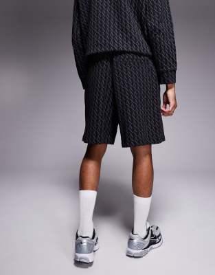 Armani Exchange All Over Logo Print Shorts In Black