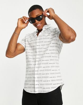Armani Exchange all over print logo shirt in white
