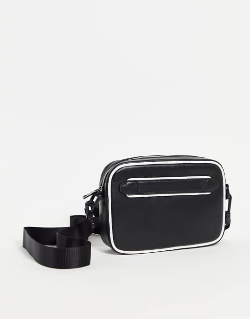 Armani Exchange circle logo cross body bag in black | ASOS