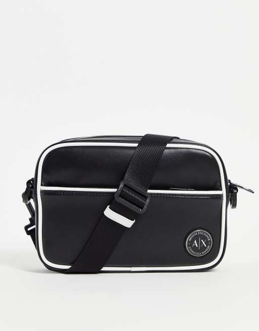 Armani Exchange circle logo cross body bag in black | ASOS