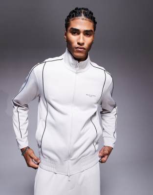 Armani Exchange Armani Exchange co-ord track jacket in cream-White