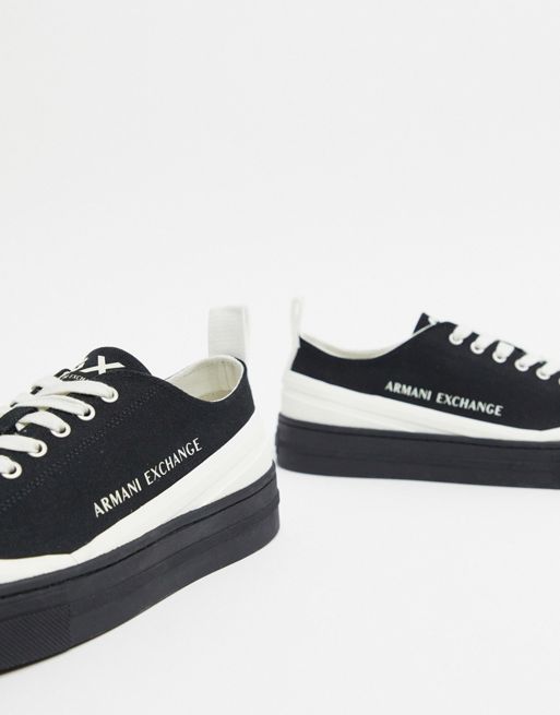 Armani Exchange contrast logo canvas trainers with gum sole in black | ASOS
