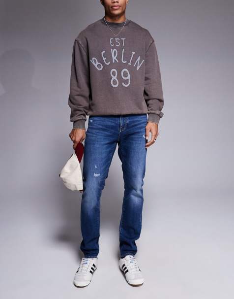 Armani Exchange – Eng geschnittene Jeans in mittelblauer Waschung - view 1