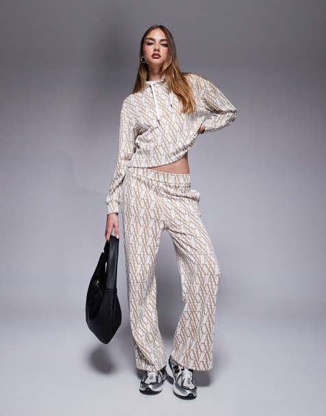 Armani Exchange - Gebreide broek met wijde pijpen en monogramlogo in beige, deel van co-ord set - view 1