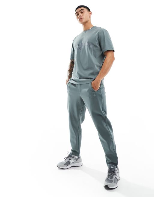 Armani Exchange – Gröna joggingbyxor i sweatshirttyg med broderad logga