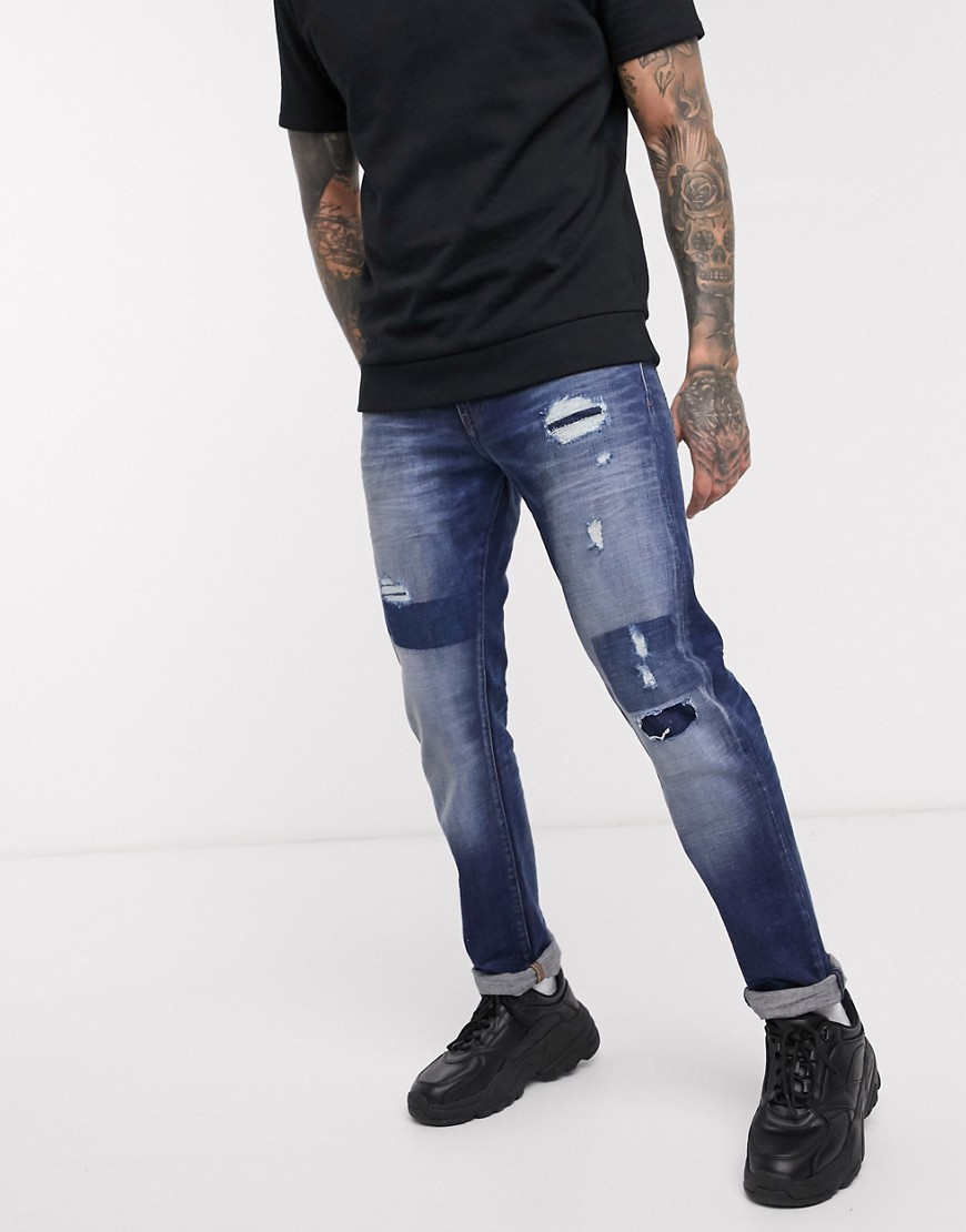 Armani Exchange - J13 - Jeans slim con strappi e rammendi lavaggio medio-Blu