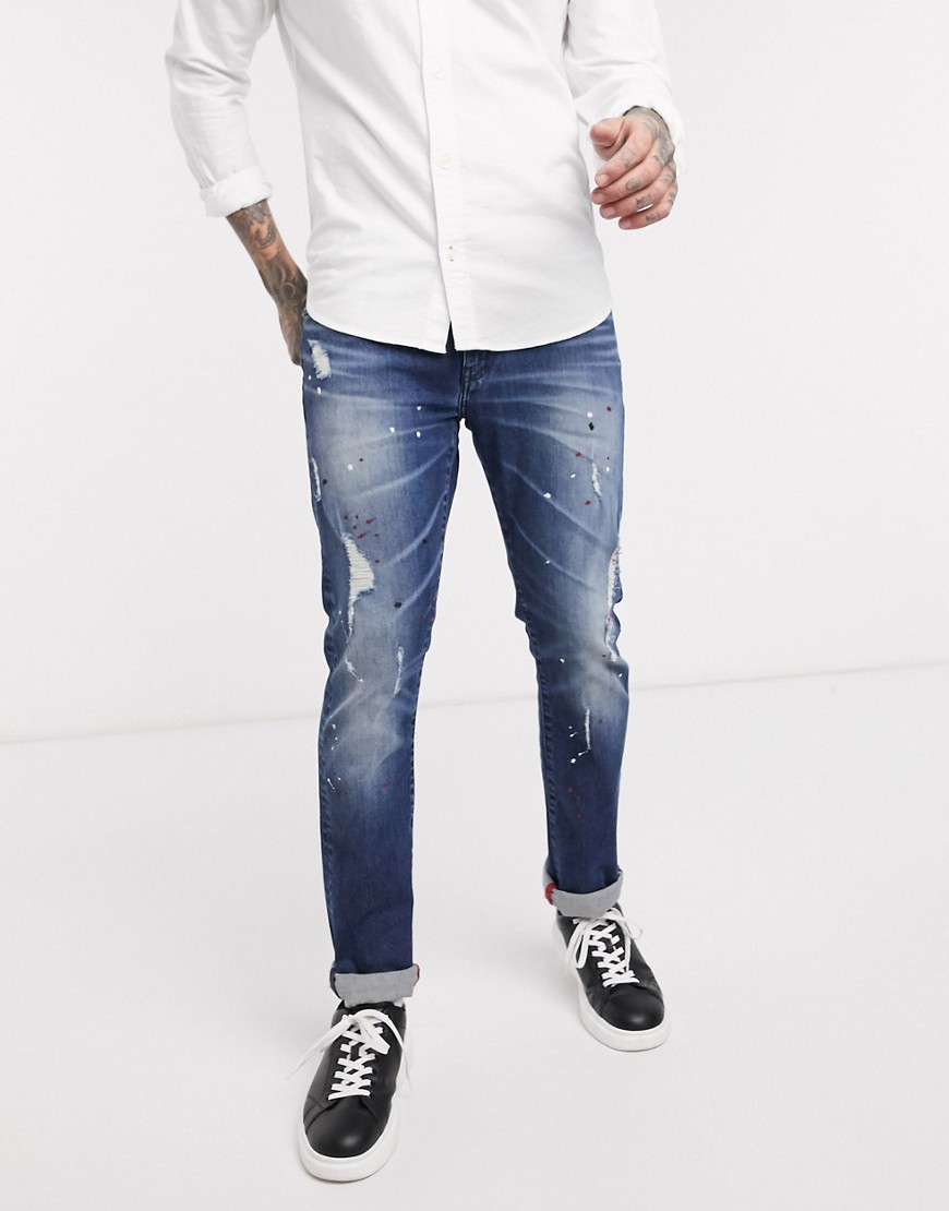Armani Exchange J13 – Mellanblå jeans med smal passform och fläckar från målarfärg