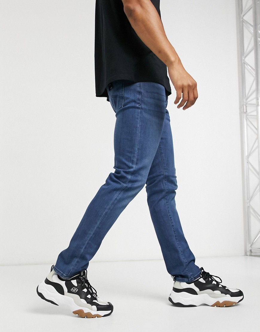 Armani Exchange J13 slim fit jeans in mid blue wash