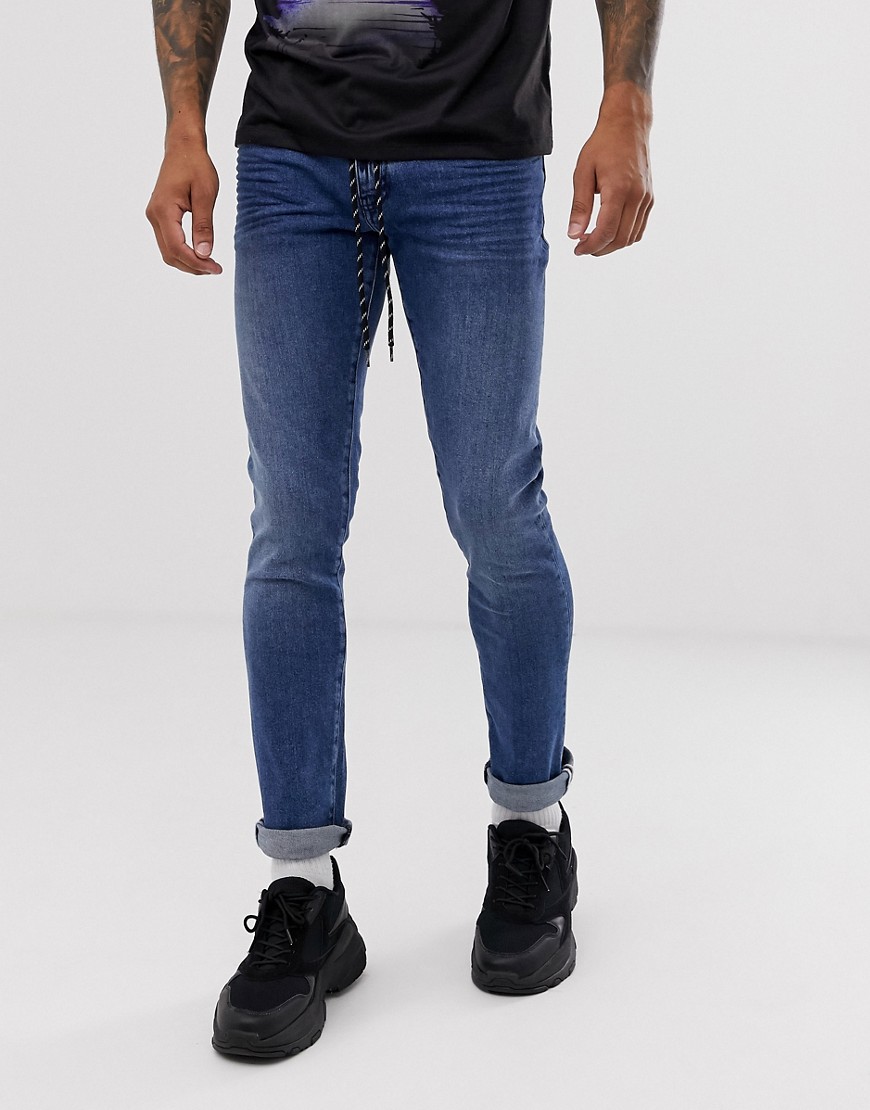 Armani Exchange J14 stretch skinny fit jeans in mid wash-Blue