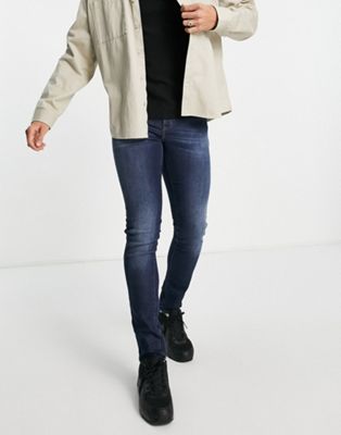 Jeans Armani Exchange - J33 - Jean ultra skinny à délavage moyen