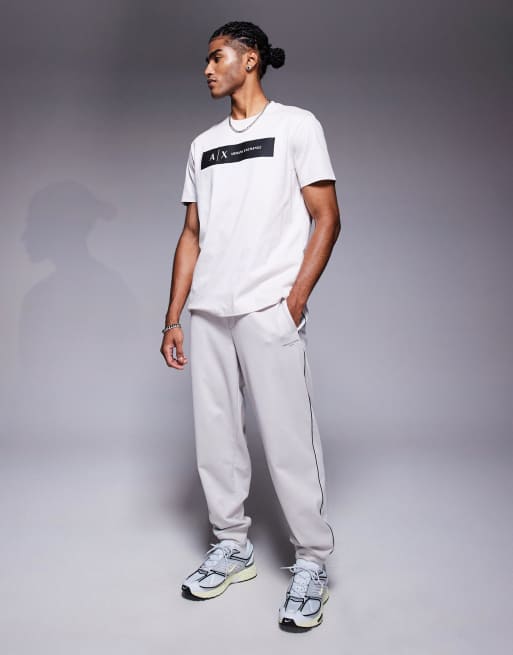 Armani Exchange - Joggers color crema con fondo elasticizzato in coordinato