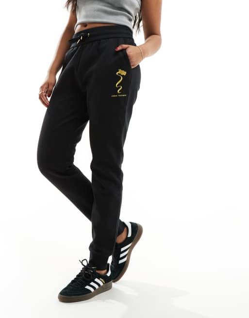 Armani Exchange - Joggingbroek met drakenprint in zwart