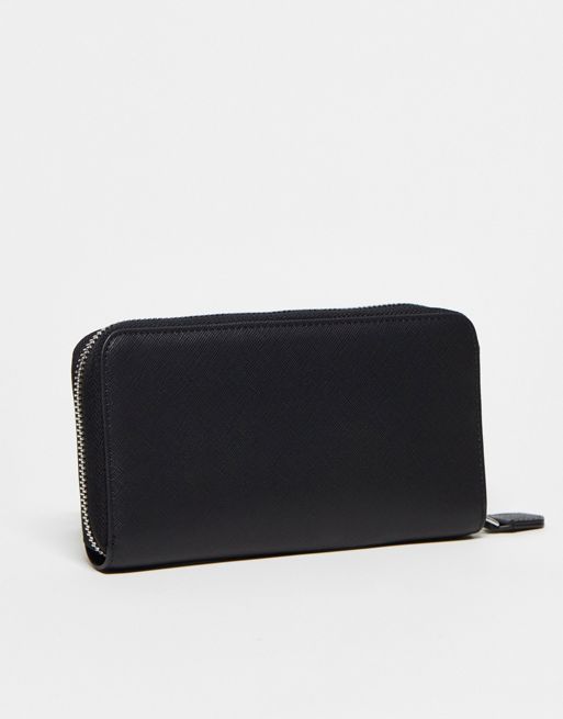 Armani Exchange leather zip round purse in black | ASOS