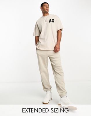Armani Exchange logo joggers in beige mix and match-Neutral
