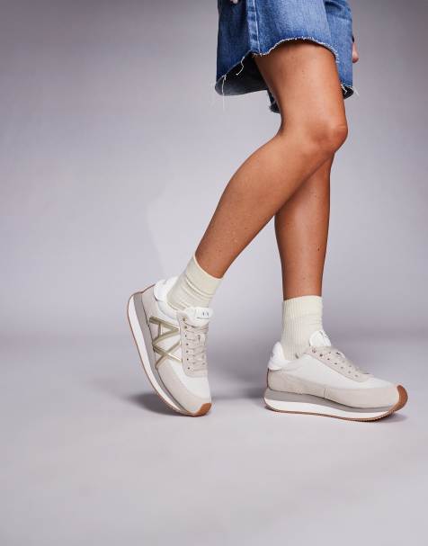 Armani Exchange logo sneakers in tan and gold - view 1
