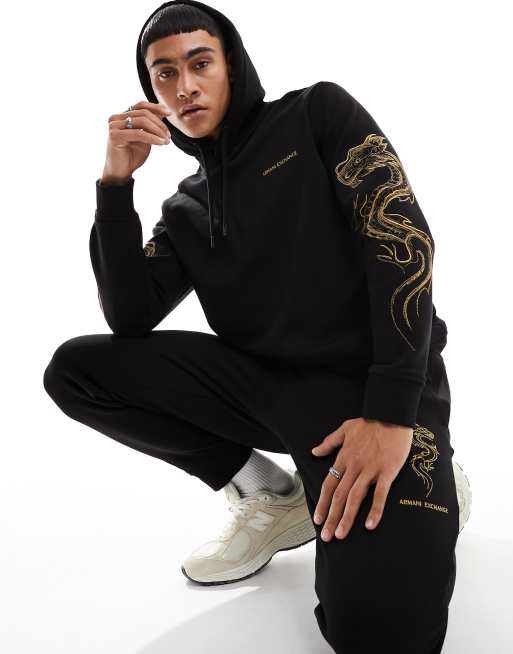 Armani Exchange lunar capsule gold embroid dragon logo hoodie in black ...