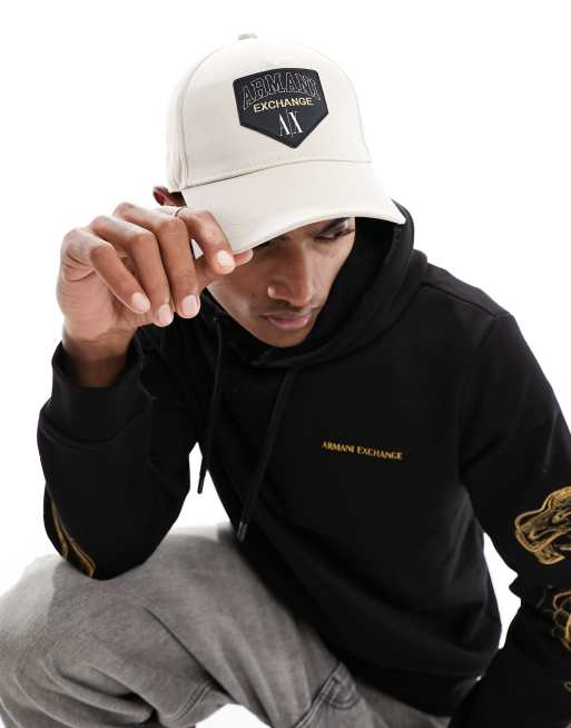 Armani Exchange - Lys beige baseball-kasket med logo
