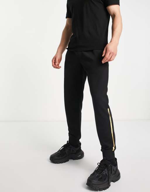 Armani Exchange metallic detail sweatpants in black & gold | ASOS