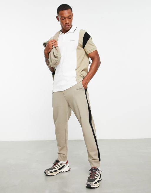 Armani Exchange side stripe pants in stone | ASOS