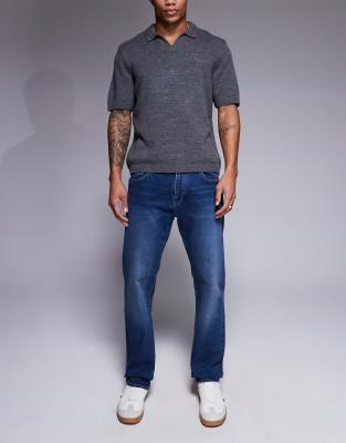 slim jeans in mid wash blue