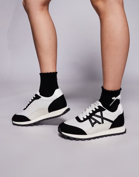 Armani Exchange suede mix logo trainers in black and white - view 1
