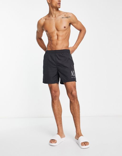 Armani Exchange swim shorts in black | ASOS