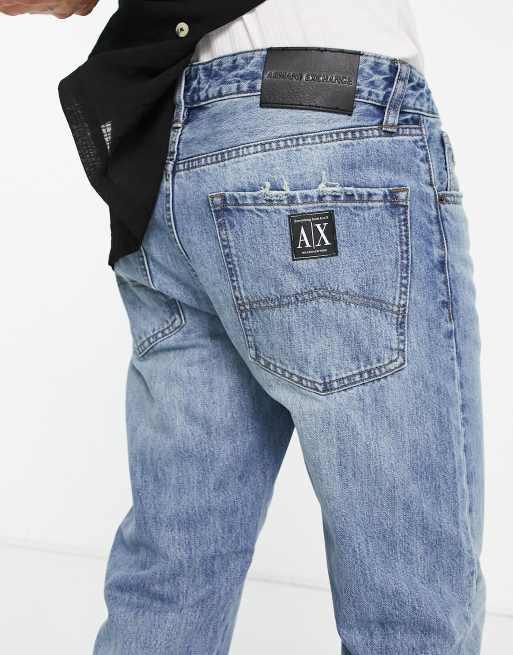 Armani Exchange tapered jeans in light wash blue | ASOS