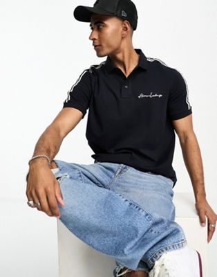 Armani Exchange text logo polo shirt in navy with stripe sleeves