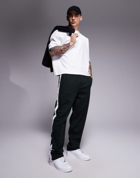 Armani Exchange tracksuit joggers with logo taping in green - view 1