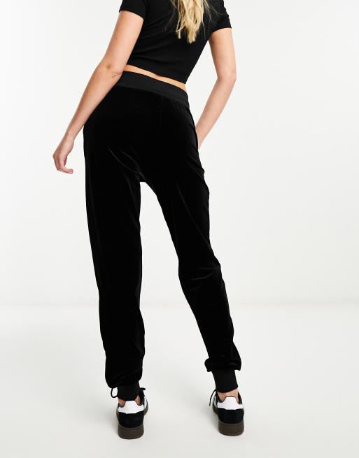 Armani Exchange velour joggers in black ASOS