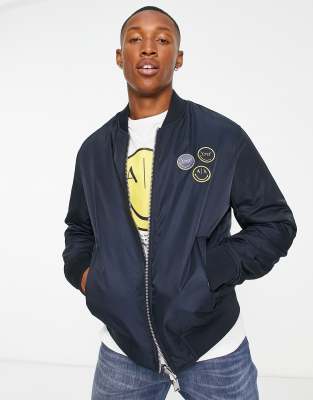 Armani Exchange x Smiley Face reversible bomber jacket in navy