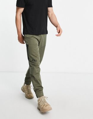 Armani Exchange zip pocket cargo trousers in khaki-Green