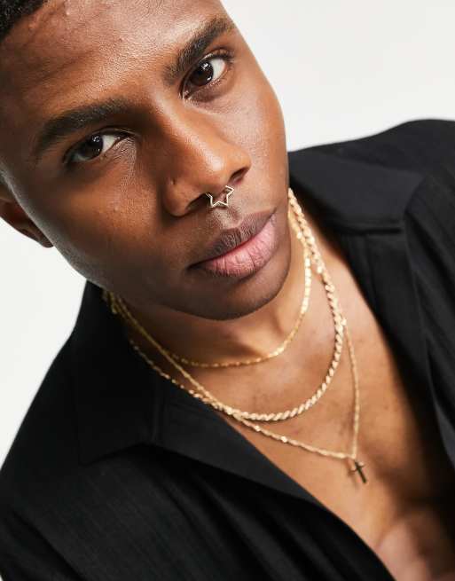 Aro para el septum falso dorado con diseño de estrella de ASOS DESIGN