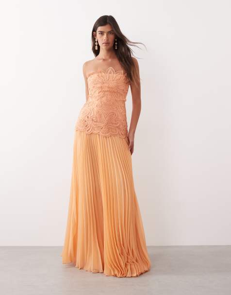 ARRANGE abstract cutwork bandeau maxi dress with pleat skirt in soft peach - view 1