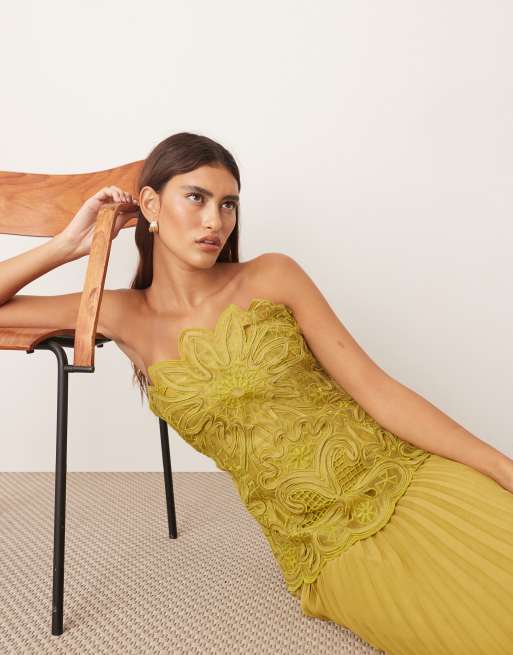 ARRANGE abstract cutwork bandeau maxi dress with pleated skirt in olive green