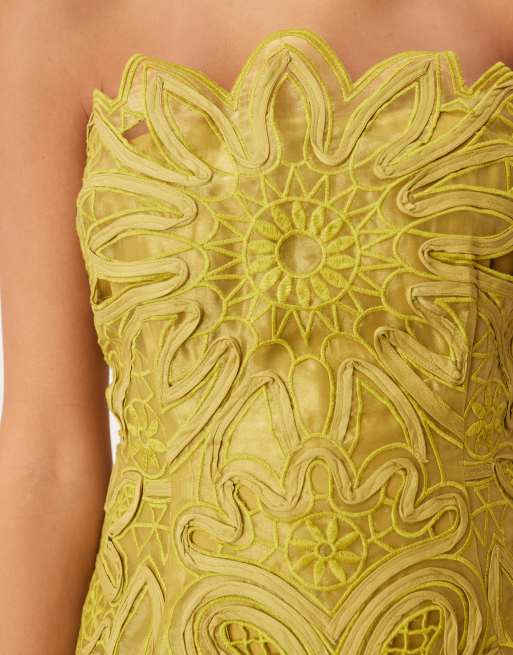 ARRANGE abstract cutwork bandeau maxi dress with pleated skirt in olive green