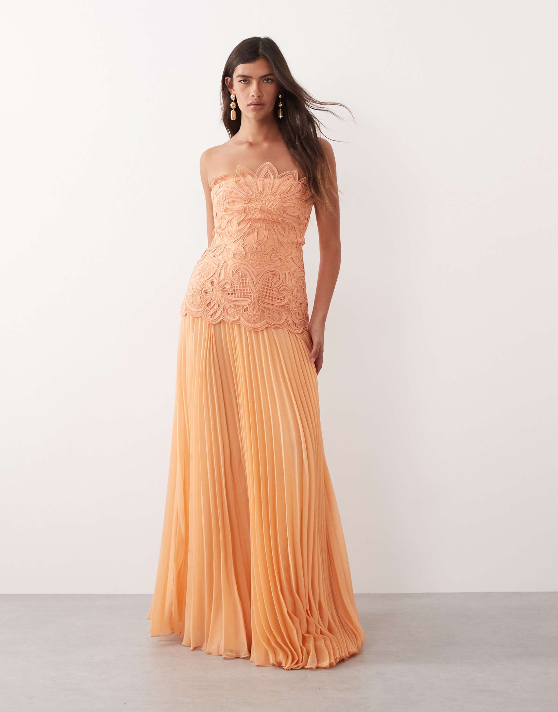 arrange abstract cutwork strapless maxi dress with pleated skirt in soft peach