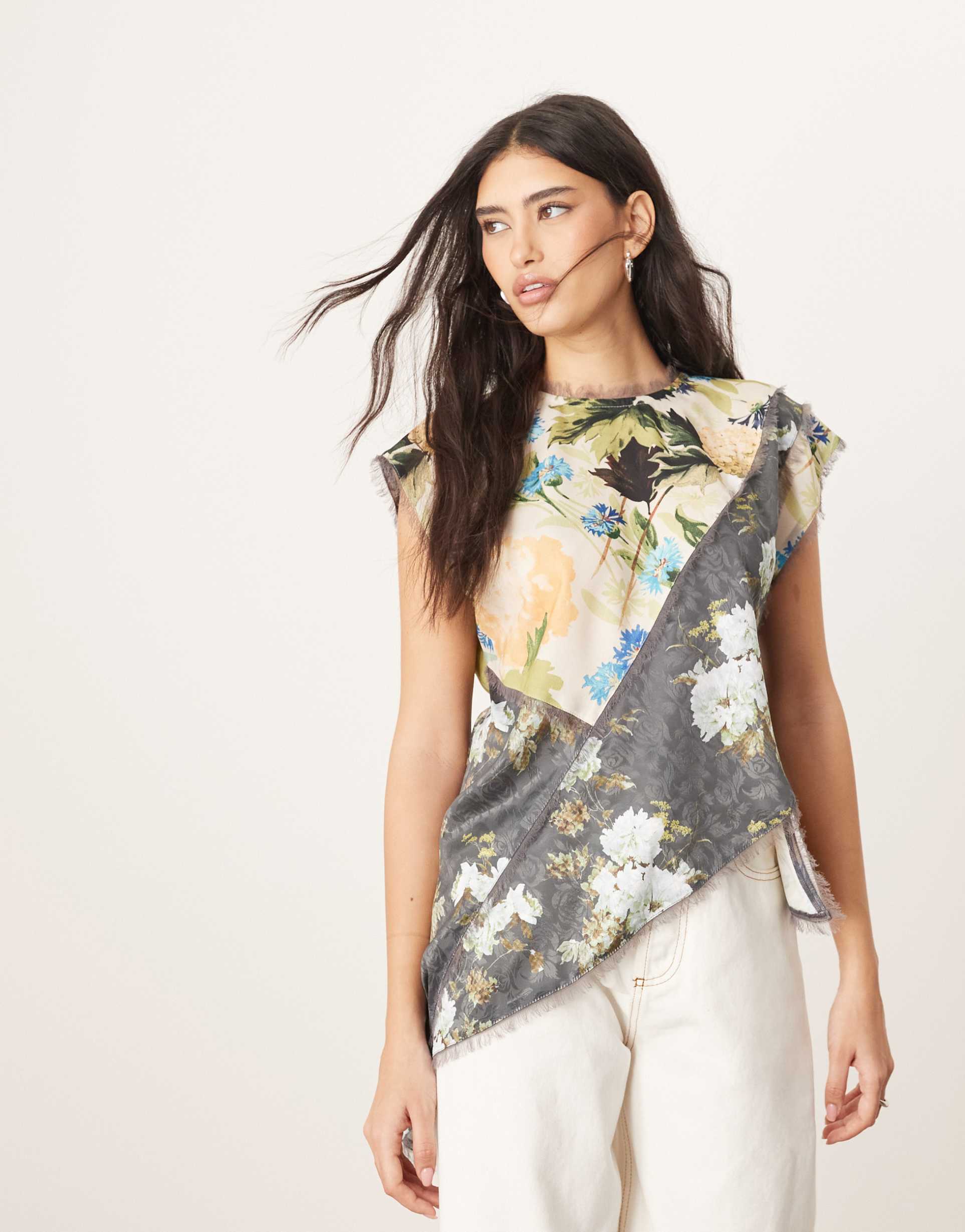 arrange asymmetric top with color block detail in floral print