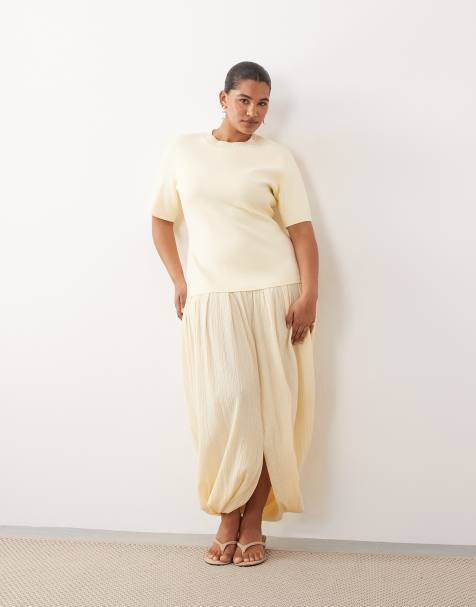 ARRANGE – Bladożółta dzianinowa sukienka hybrydowa midi z krótkimi rękawami - view 1