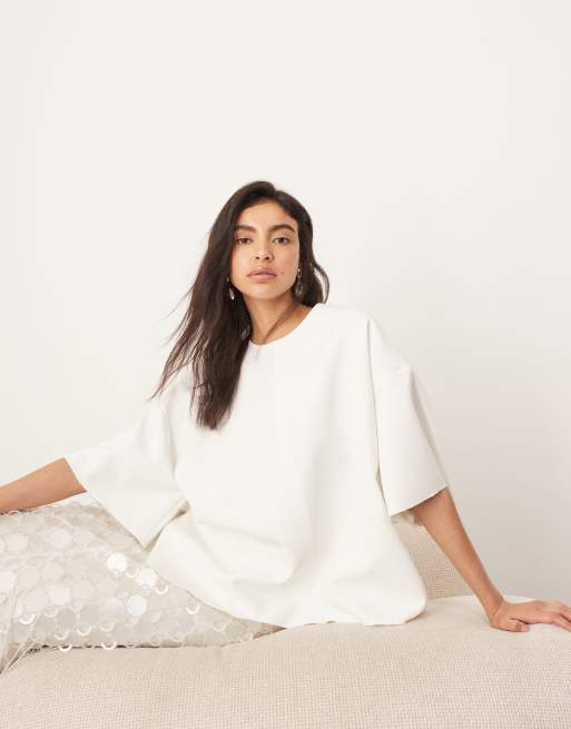 ARRANGE boxy seamed top with tie back detail in white